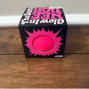 Pink glow in the dark Needoh stress ball
